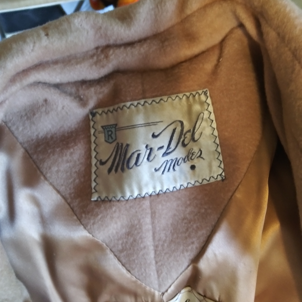 Vintage womans camel hair coat with fur collar